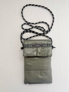 Caraa Olive Green Puffer Crossbody Phone Pouch with Black & white Rope Strap.
